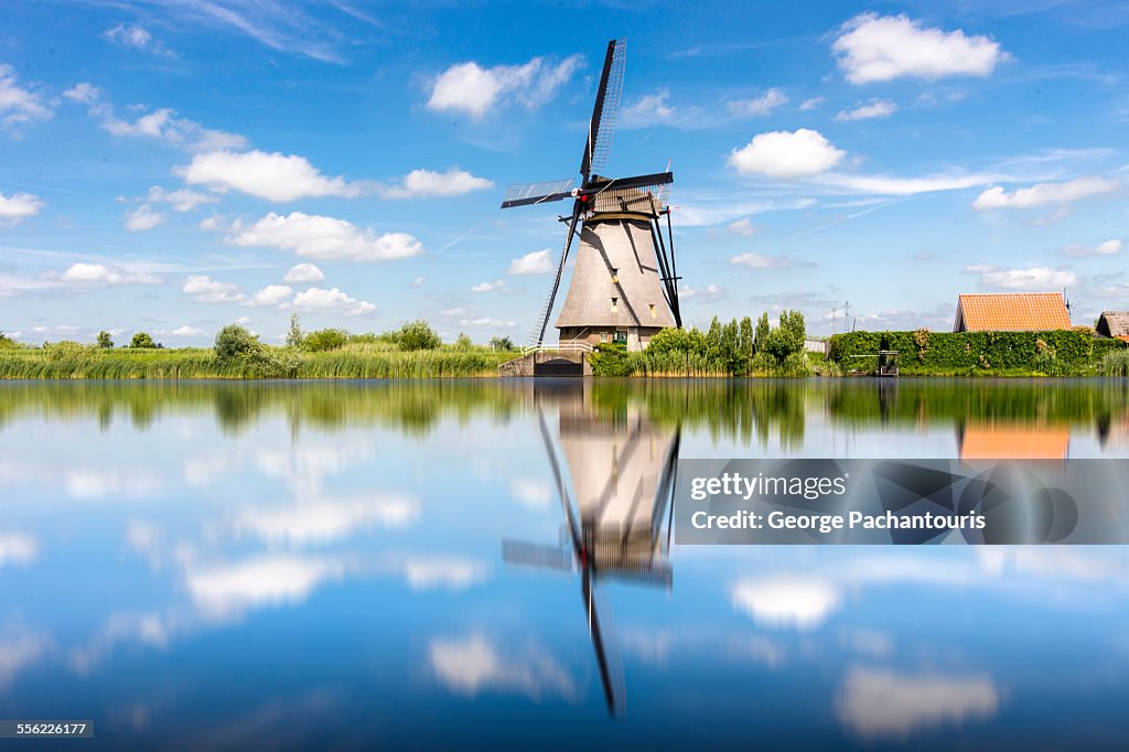 Windmill reflection on water