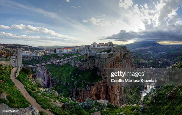 constantine gorge, hanging bridge and stormy cloud - algeria stock pictures, royalty-free photos & images