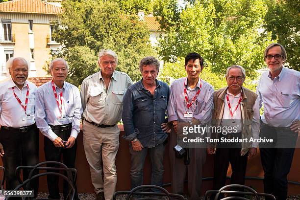 Legendary British war photographer Don McCullin pictured with Vietnamese photographers who covered the war with the North Vietnamese side. The...