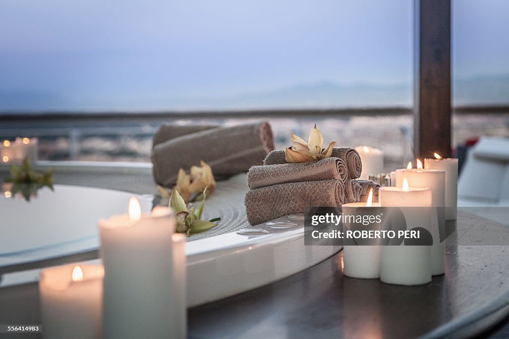 Bath and candles in luxury hotel room