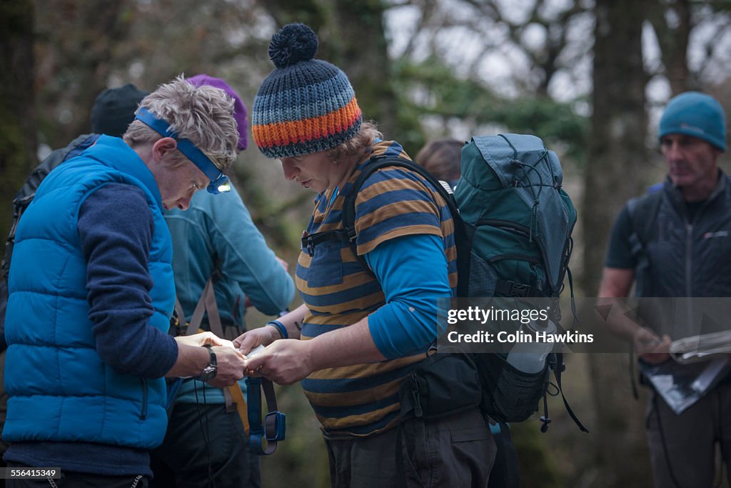 Group of people preparing to go orienteering