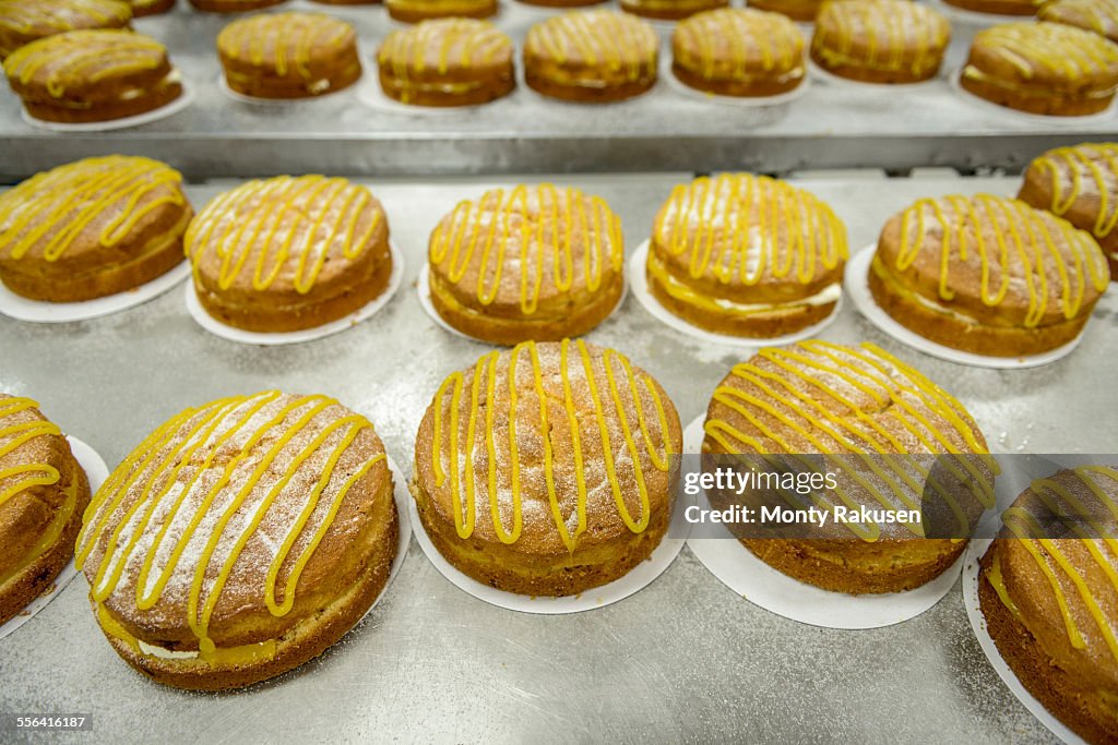 Prepared cakes in cake factory, close up