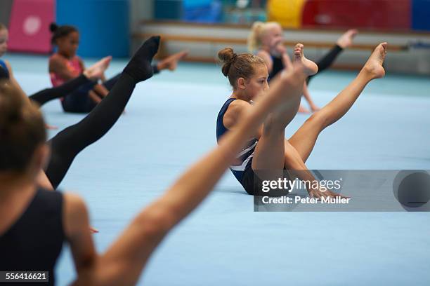 young gymnasts practising moves - gymnastics british championships stock pictures, royalty-free photos & images