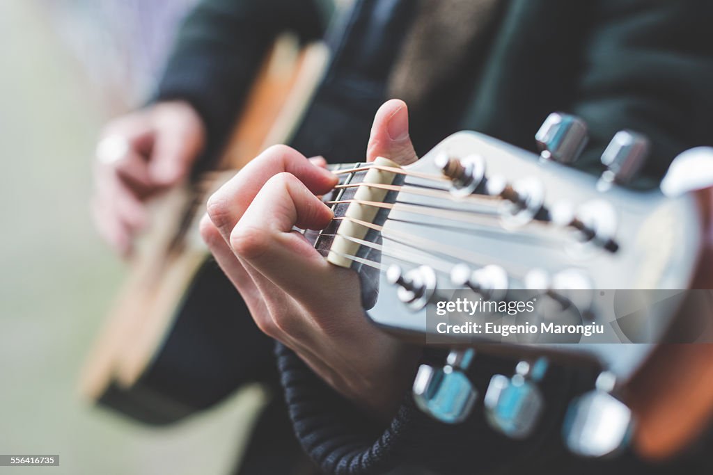 Musician playing guitar