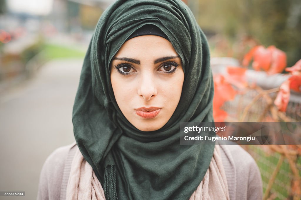 Close up portrait of young woman wearing hijab