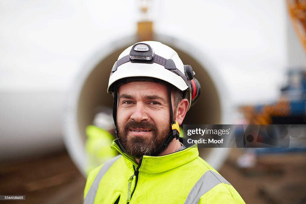 Portrait of engineer at wind farm