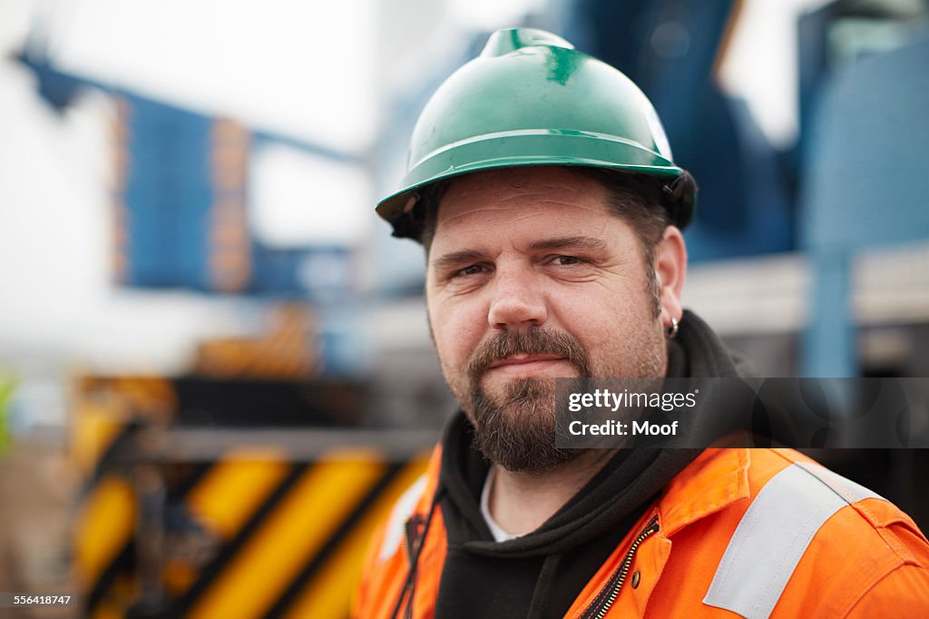 Portrait of engineer at wind farm