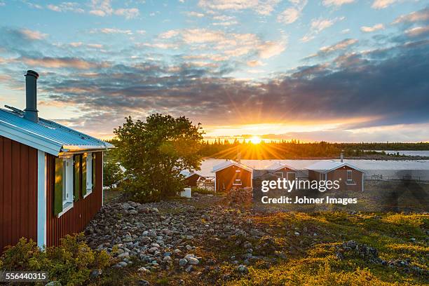 coastal houses at sunset - archipelago stock pictures, royalty-free photos & images