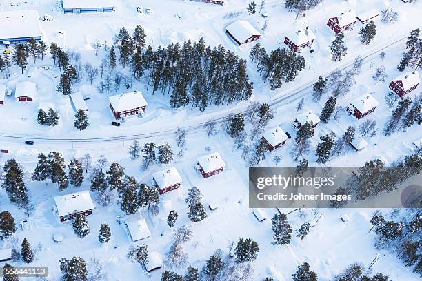 houses at winter, aerial view - lappland aerial view stock-fotos und bilder