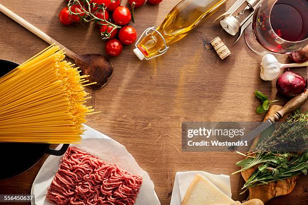 italian food, ingredients for spaghetti bolognese on wood - bolognese sauce stock pictures, royalty-free photos & images