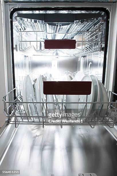 dishwasher in kitchen with dirty dishes - dishwasher stock-fotos und bilder