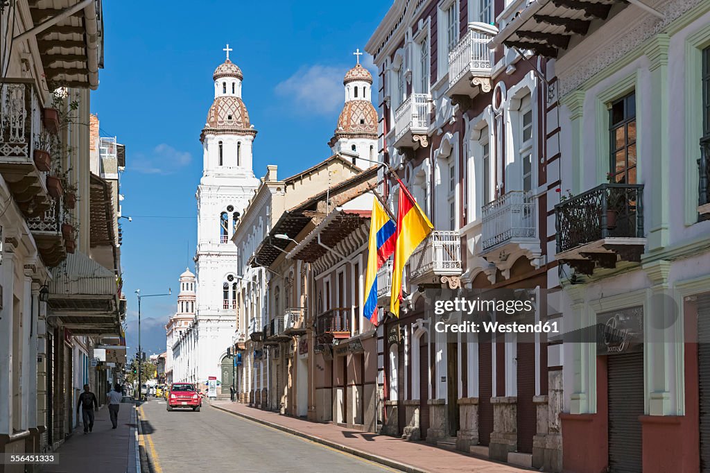 Ecuador, Cuenca, view to row of houses and Santo Domingo church in the background