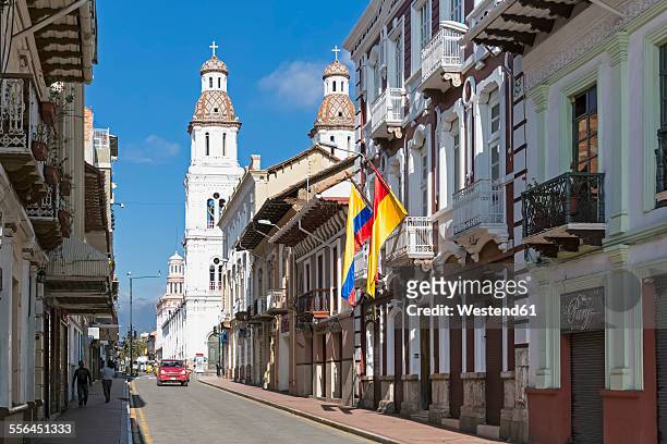 ecuador, cuenca, view to row of houses and santo domingo church in the background - ecuador stock pictures, royalty-free photos & images