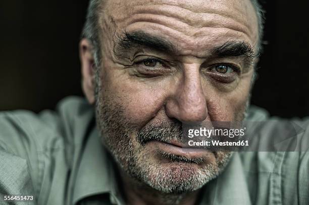 portrait of sceptical senior man - close up stock pictures, royalty-free photos & images