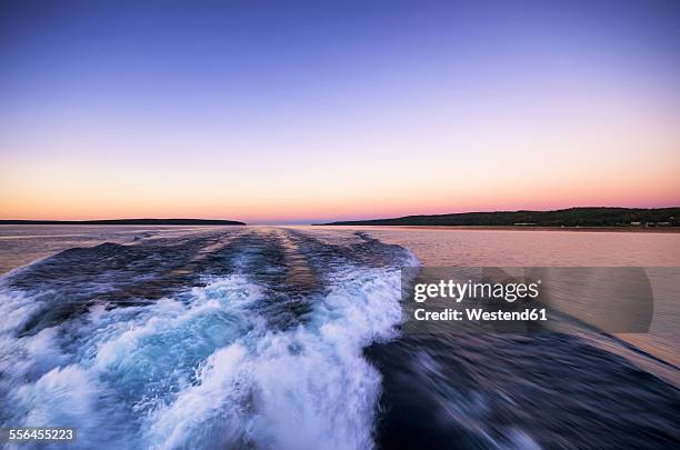 usa, michigan, lake superior, boat wake - boat wake stock pictures, royalty-free photos & images
