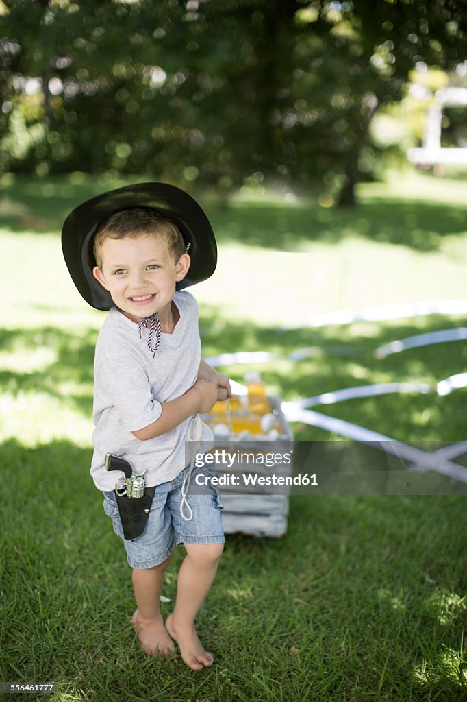 Boy pulling a crate of cool drinks