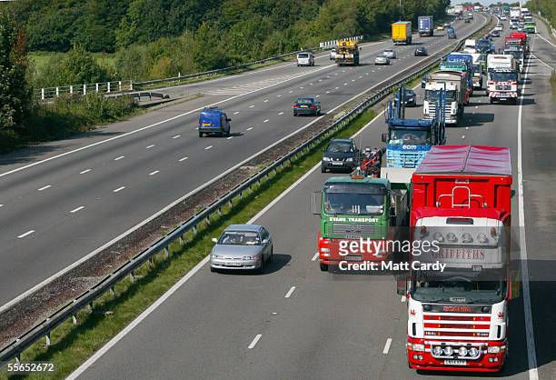 Fuel protesters from South Wales Hauliers Association stage a 20mph rolling blockade along a 100 miles of the M4 motorway from Crosshands, near...