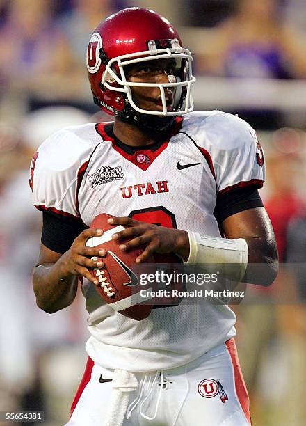 Quarterback Brian Johnson of the Utah Utes drops back to pass against the Texas Christian University Horned Frogs on September 15, 2005 at Amon...