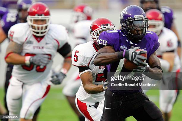 Wide receiver Cory Rodgers of the Texas Christian University Horned Frogs makes a pass reception against Ryan Smith of the Utah Utes on September 15,...