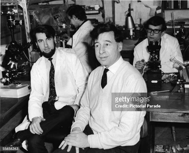 British physiologist Robert Edwards and his team of scientists work in their laboratory at Cambridge University, Cambridge, England, March 28, 1969....