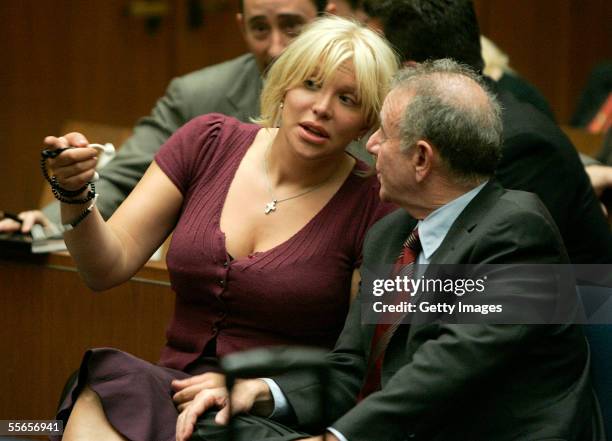 Actress/musician Courtney Love and attorney Howard Weitzman appear at a sentencing for probation violations at the Clara Shortridge Foltz Criminal...