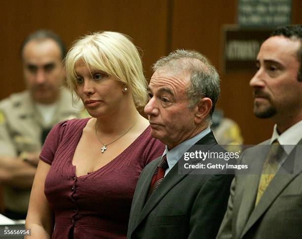 Actress/musician Courtney Love and attorneys Howard Weitzman and Michael Rosenstein appear at a sentencing for probation violations at the Clara...