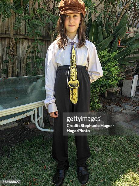 girl dressed with tie - kid in big shoes stock pictures, royalty-free photos & images