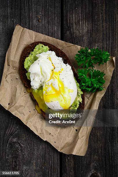 Healthy toast with avocado and poached egg