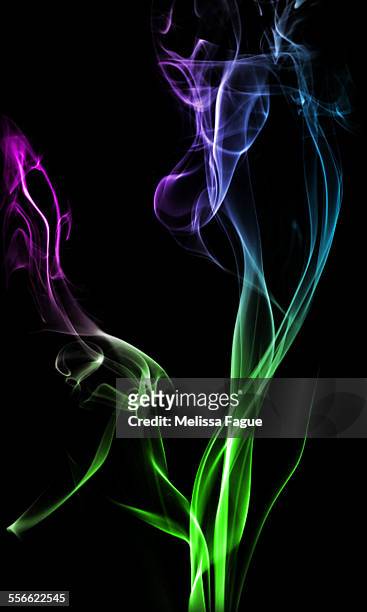 green, blue, and purple colored smoke - wilmington delaware stock-grafiken, -clipart, -cartoons und -symbole