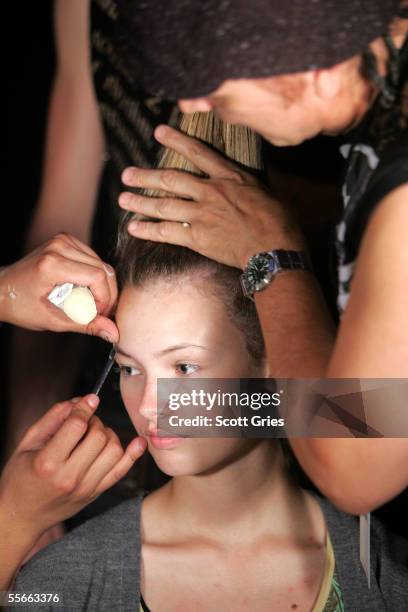 Model getting ready for the runway Backstage at the LAMB By Gwen Stefani Spring 2006 fashion show