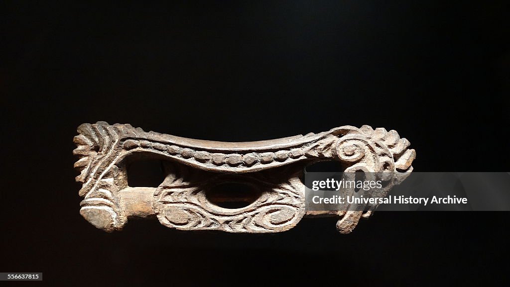 Wooden headrest from the Nagodombi of Yesimbit, in East Sepik, Papua New Guinea late 19th century.