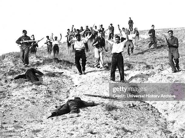 Nationalist troops capture Republican soldiers. In 1936, at the Battle of Somosierra, in the heights of the pass between Carlist and Falangist units...