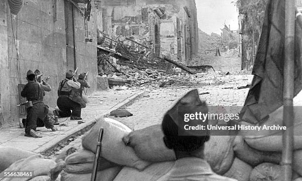 Republicans forces battle street by street against nationalists near the Alcazar in Toledo, 1936.