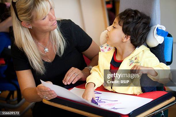 Disabled Child, Clair Bois-Chambesy school and home Offering structure to children from 1 to 12 years old, suffering from multiple disabilities....