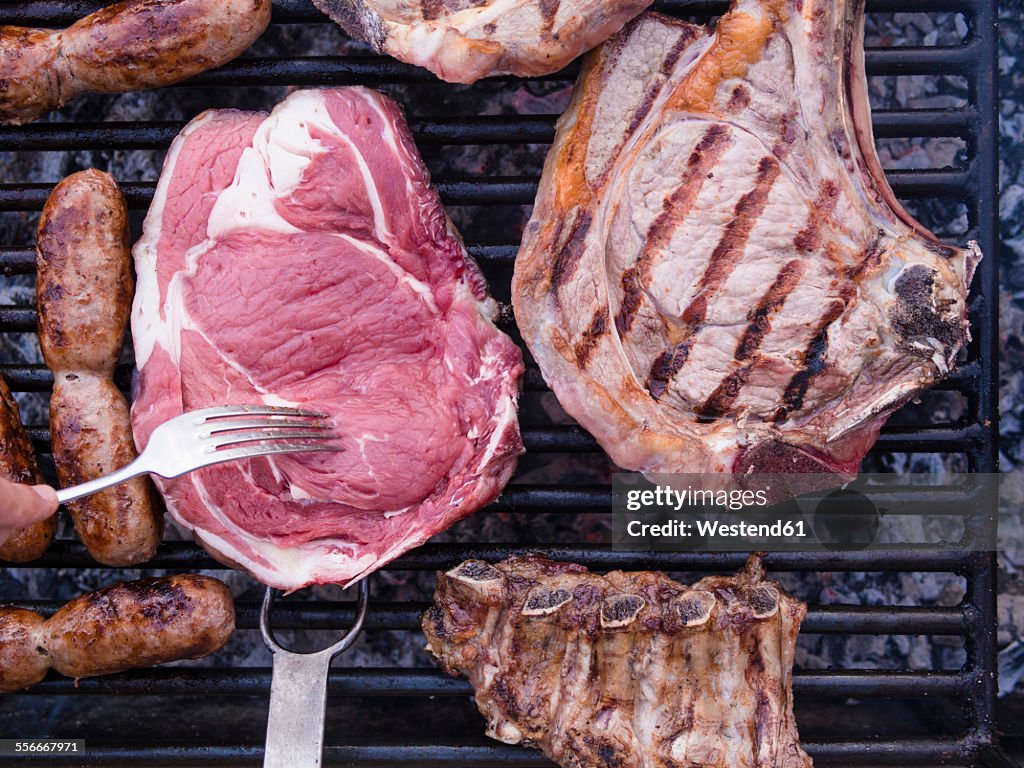 Italian barbecue with Bistecca alla Fiorentina, Salsiccia and cured pork