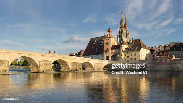 germany, bavaria, regensburg, view of old town and old stone bridge - regensburg stock-fotos und bilder