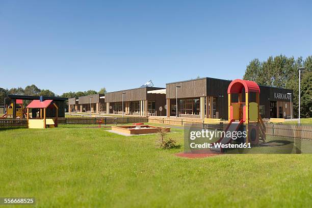 estonia, playground of newly built kindergarten - abandoned playground stock pictures, royalty-free photos & images