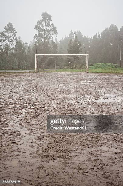 spain, galicia, valdovino, muddy soccer field on a rainy day - サッカー場　無人 ストックフォトと画像