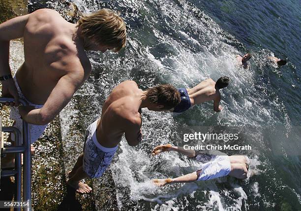 Swans players dive into the water during the Sydney Swans recovery session held at Clovelly Beach September 17, 2005 in Sydney, Australia.