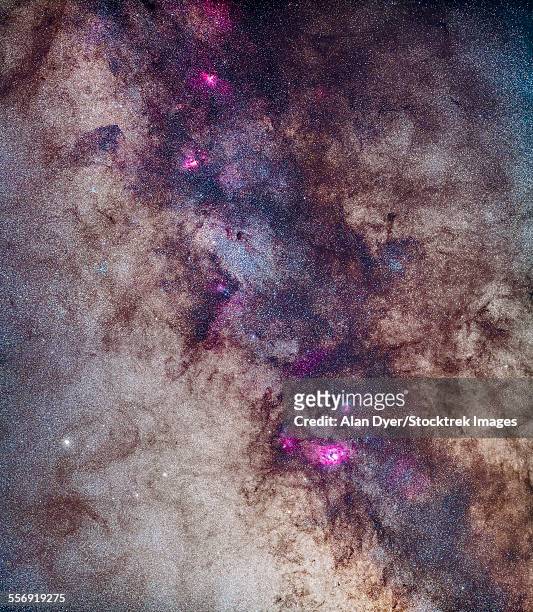the milky way around the small sagittarius star cloud. - nebulosa del águila fotografías e imágenes de stock