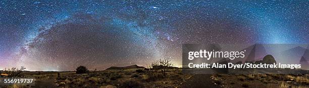 panorama of milky way and zodiacal light over new mexico. - zodiacal light stock pictures, royalty-free photos & images