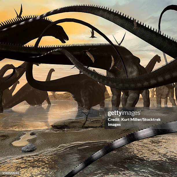 a herd of argentinosaurus marching along the side of a beach. - argentinosaurus stock illustrations