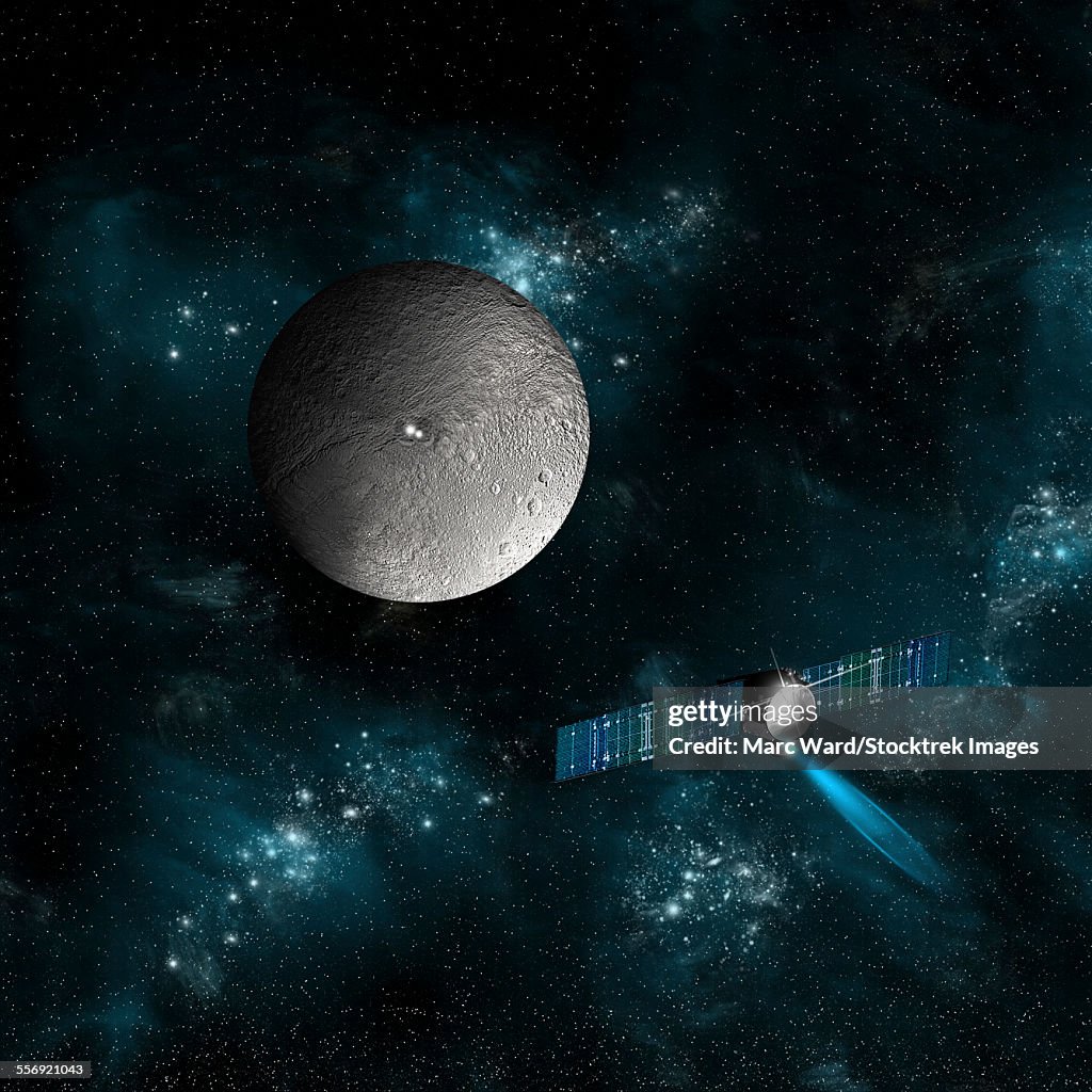 An artists depiction of the Dawn spacecraft as it approaches an encounter with Ceres. The satellite will investigate the two bright spots on the surface of the dwarf planet.