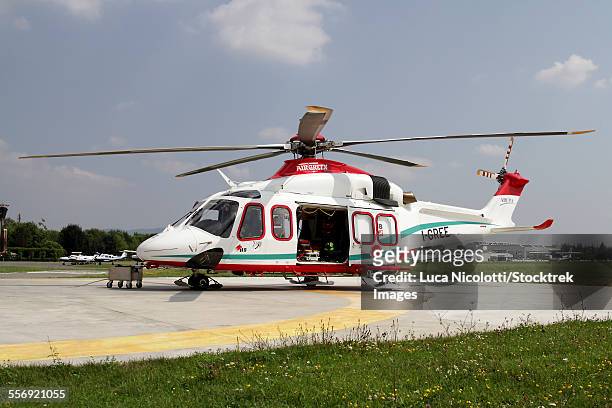 aw139 air ambulance, collegno, italy. - helicopter photos stock-fotos und bilder