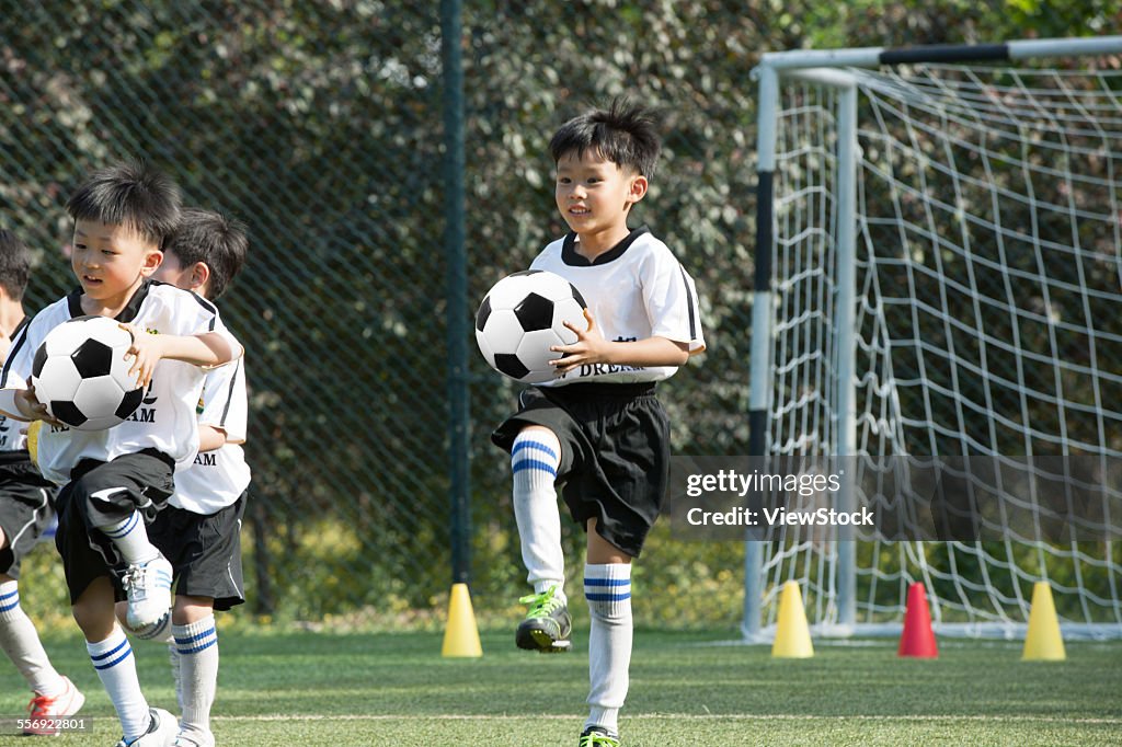 The boys made the ball movement on the football field