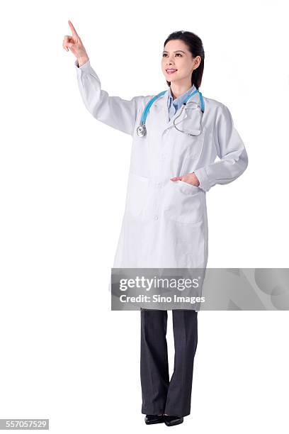 young female doctor - doctor reaching stock pictures, royalty-free photos & images