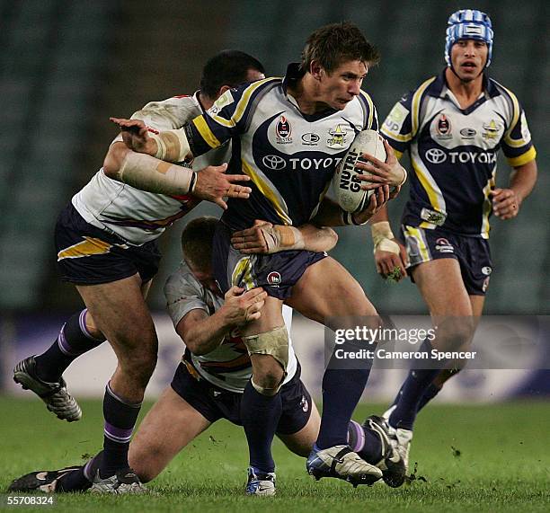 Jacob Lillyman of the Cowboys is tackled during the NRL Semi Final between the Melbourne Storm and the North Queensland Cowboys at Aussie Stadium...
