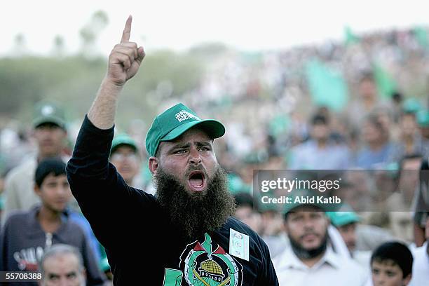 Palestinian supporters of the Islamic Resistance Movement, Hamas, shout Islamic slogans at a celebration rally of the Israeli withdrawal from Gaza...