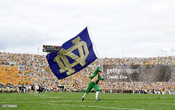 The Notre Dame Fighting Irish mascot carries the school flag on the field before the game against the Michigan State Spartans on September 17, 2005...