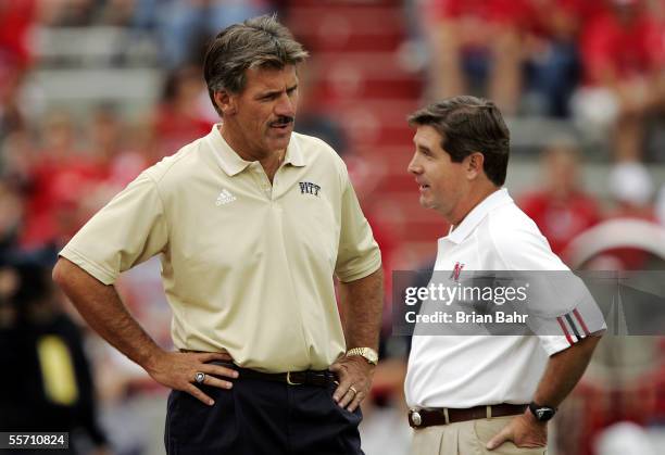 Head coach Dave Wannstedt of the Pittsburgh Panthers meets with head coach Bill Callahan of the Nebraska Cornhuskers before their game on September...